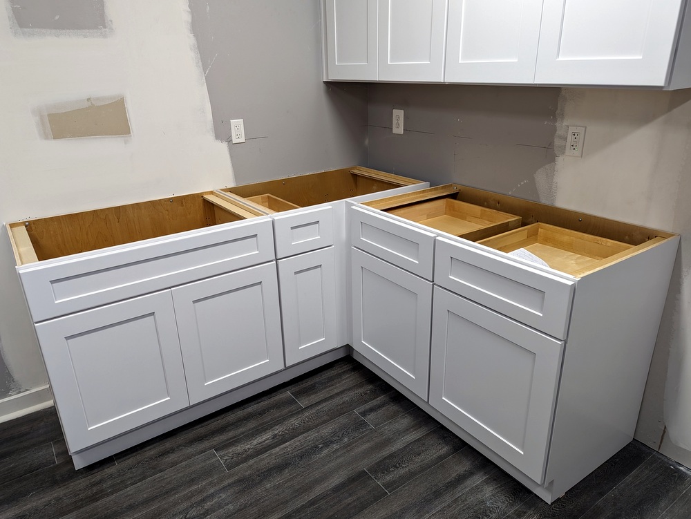 Cabinets installed in kitchenette