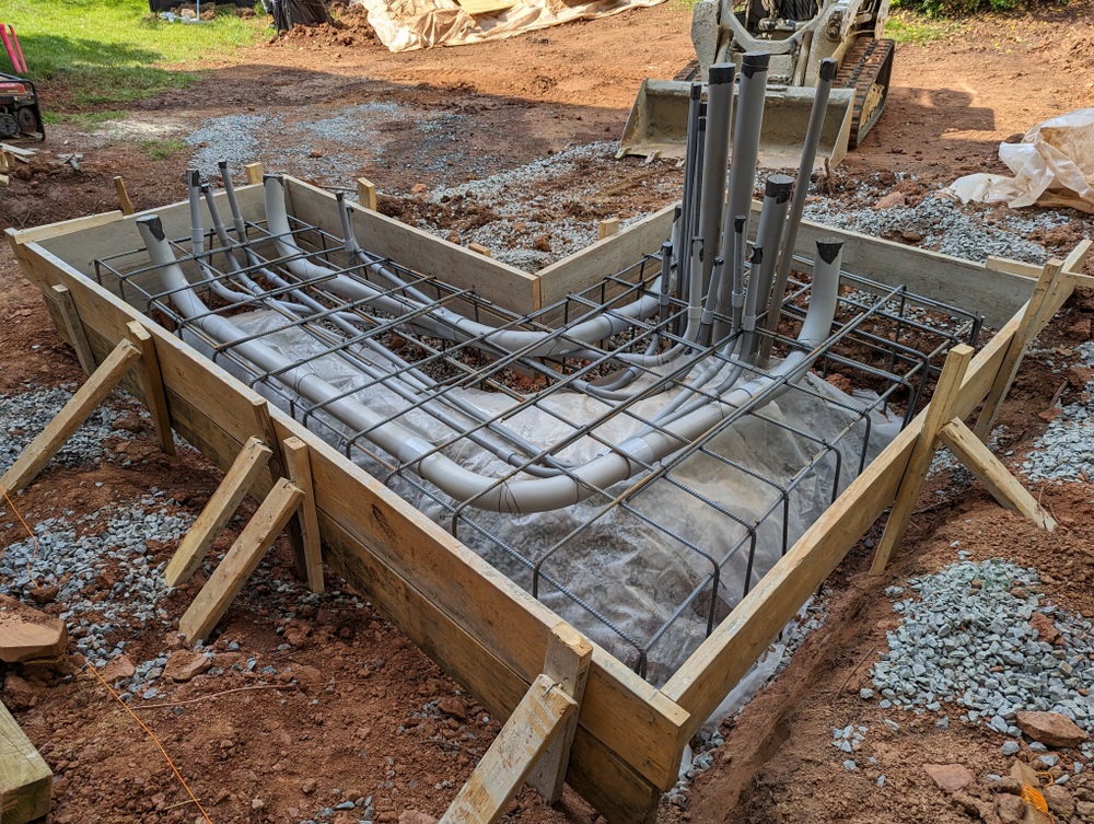 Conduit in place prior to pouring of concrete pad for new 60kw emergency backup generator