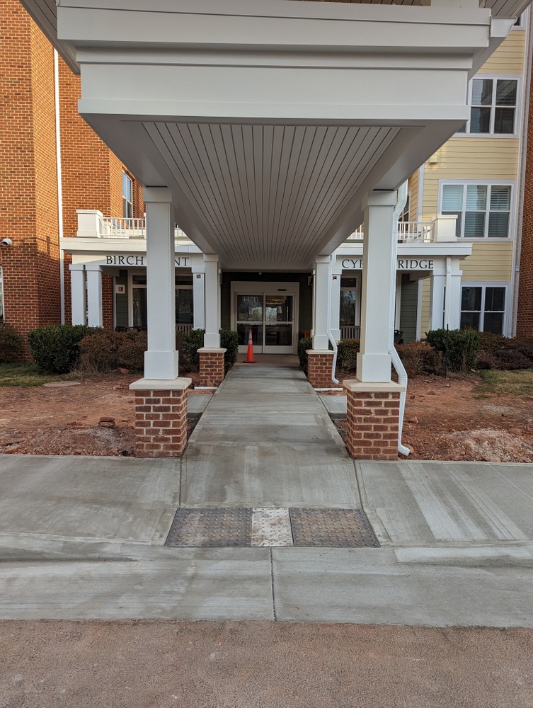 Ashby Ponds Portico final grade and sidewalk