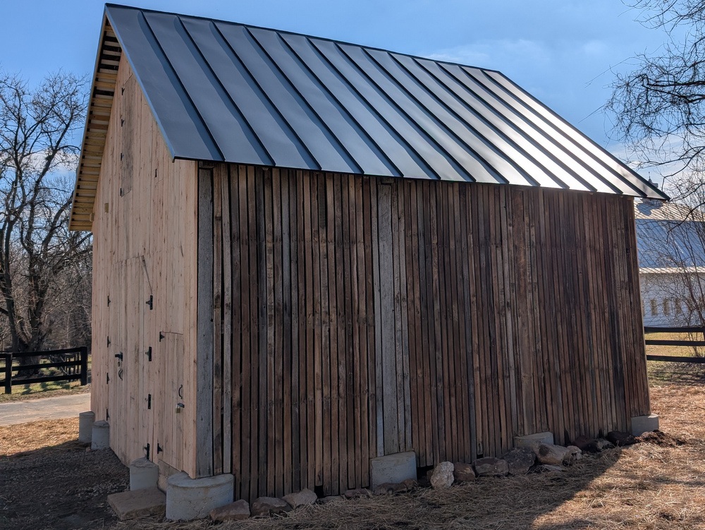 Turner Farm Corn Crib after structural repairs to foundation, new roof, and new siding to match existing