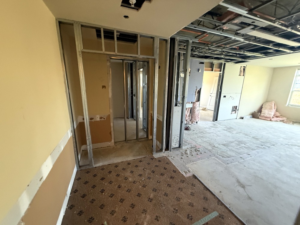 Modifications to existing plumbing, electrical, mechanical and sprinkler systems for renovated apartments